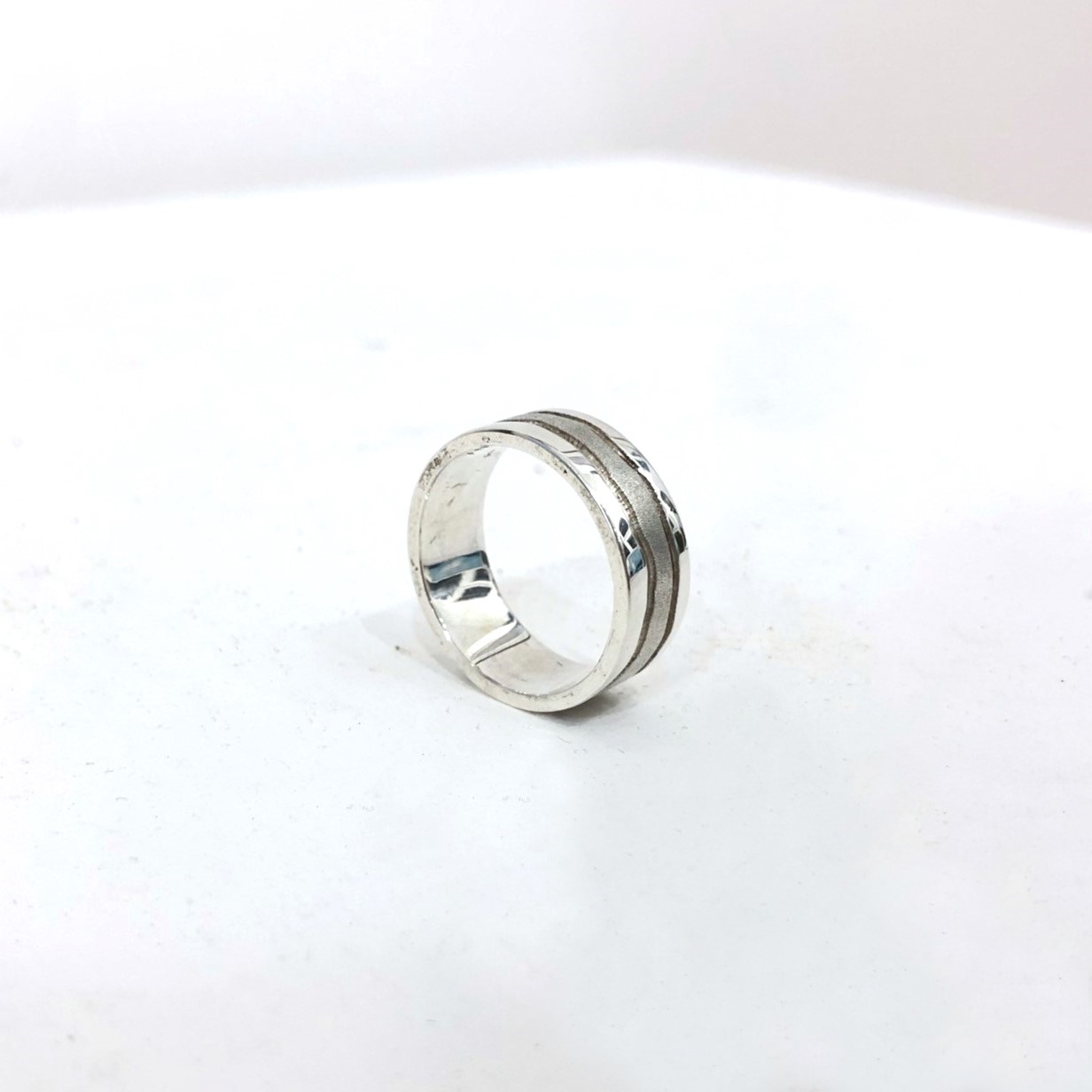'Arran Texture Ring | Sterling Silver' by artist Jen Cunningham